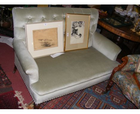 A button back late Victorian settee on turned supports