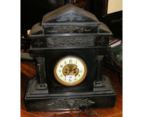 Large Victorian slate mantel clock with visible escapement