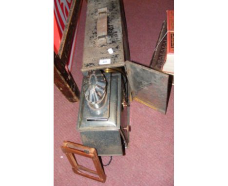 An old magic lantern, complete with carrying case