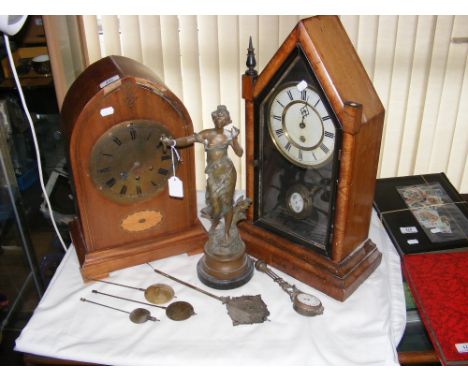 Walnut cased Lancet mantel clock timepiece, one other mantel clock, pendulums, etc.
