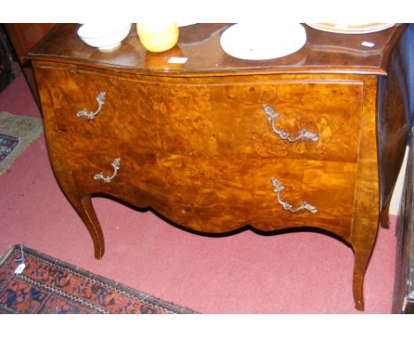 Louis XV style walnut two drawer commode with serpentine front