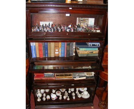 A four section Globe Wernicke style bookcase