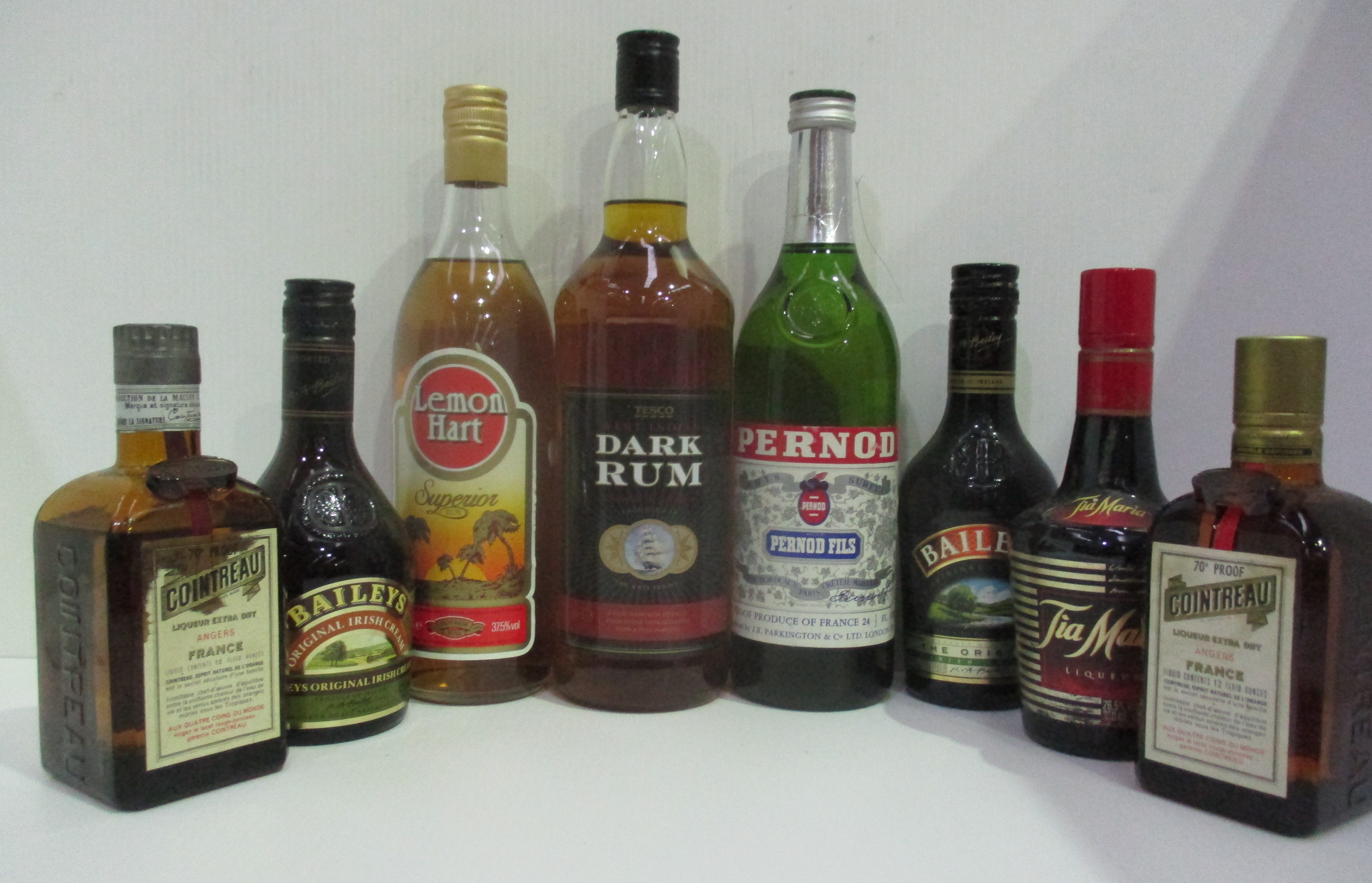 A one litre bottle of Tesco West Indian Dark rum, a 24 1/2 fl.oz bottle ...