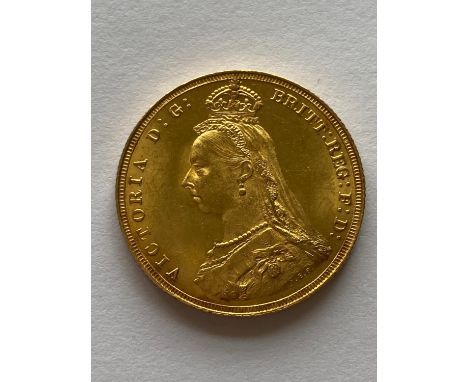 A Queen Victoria Sovereign, Jubilee bust l. reverse George and the Dragon, dated 1887.  *CR:  Light surface marks.  *BP 22.5%