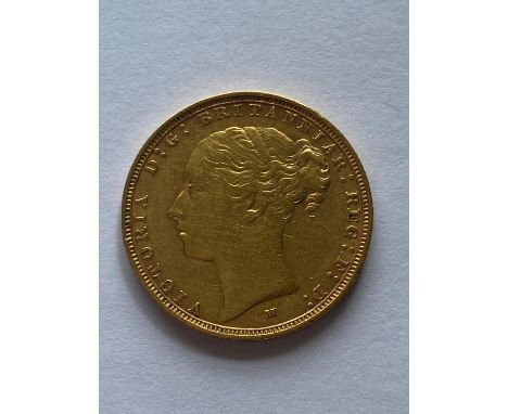 A Queen Victoria Sovereign, Young head l. reverse George and the Dragon, dated 1887.  *CR:  Light surface marks.  *BP 22.5% (