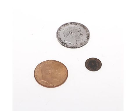 An Edward VII Halfcrown, bare head r. Reverse Crowned shields, dated 1902. An Edward VII Penny 1910, and a similar third fart