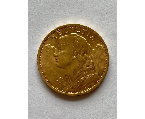 A Swiss Gold 20 Franc coin, 1902, B. Bern, female head l, Swiss Cross on shield, c. 6.45g.  *CR:  Good condition.  *BP 22.5% 