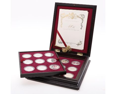 A Queen Elizabeth II 40th Anniversary silver Crown collection of 18 Crown sized silver proof coins, the majority 28.28g, othe