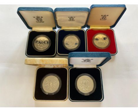 Royal Mint silver proof crowns for 1977, 1980, 1981 and 1990 (2). 5 coins in capsules and Royal Mint cases, with inserts.  *C