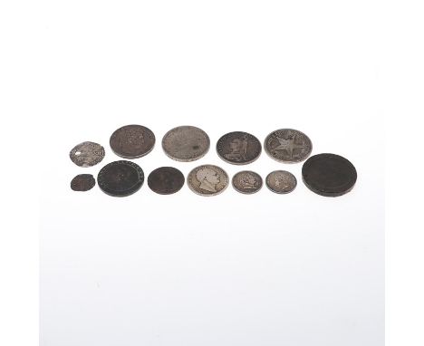 A small collection of coins to include a hammered Shilling, pierced, probably Charles I, a  George III Shilling 1817, a simil