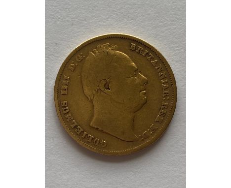 A William IV Sovereign, First bust r. Shield reverse, dated 1831.  *CR:  Surface marks and rubbing.  *BP 22.5% (18.75% plus V