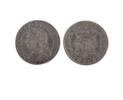 An Oliver Cromwell Shilling dated 1658, Draped bust l. Crowned shield. With graffiti initials WE to the obverse field.  *CR: 