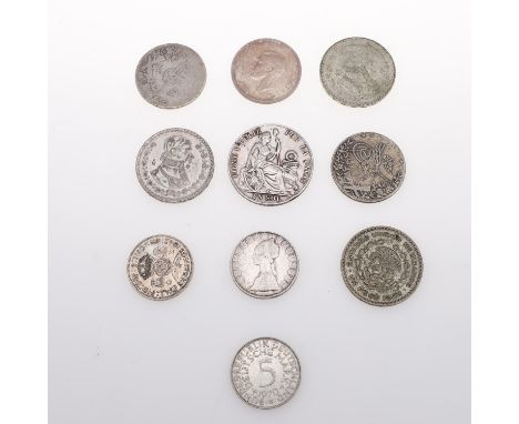 A collection of ten silver coins including an 1890 Peruvian 'Sol', A Mexican 1952 Peso, 1942 Great Britain Florin and others.