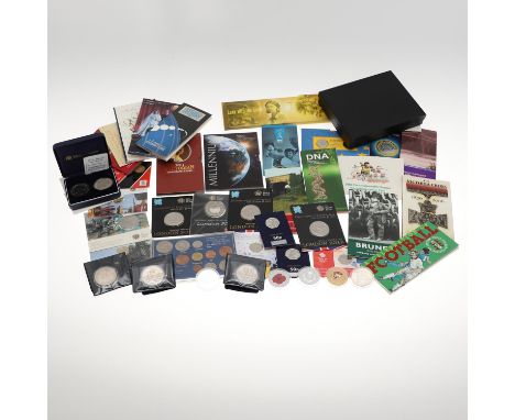 A collection of commemorative coins, many in original packaging to include 50p coins celebrating the NHS, Girl Guides, the Eu