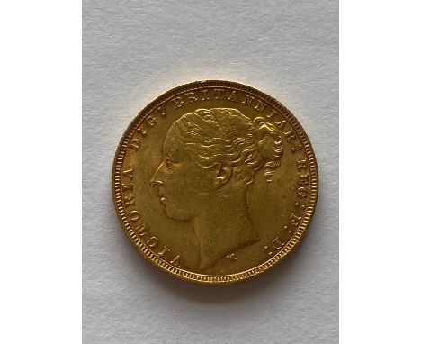 A Queen Victoria Sovereign, young bust l. reverse George and the Dragon, dated 1880.  *CR:  Light surface marks.  *BP 22.5% (