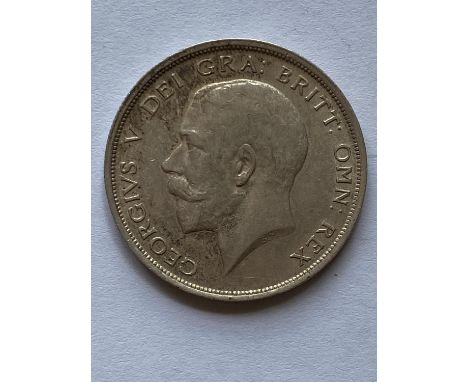 A George V Halfcrown dated 1915. Bare head l. Crowned shield in Garter.  *CR:  Surface marks and light scratches.  *BP 22.5% 