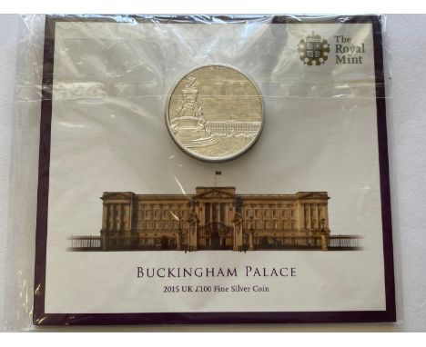A Royal Mint 2015 Buckingham Palace £100 Fine Silver Coin, 62.86g. In original packaging.  *CR:  As issued.  *BP 22.5% (18.75