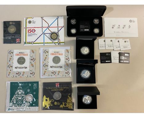 Royal Mint Issues: A 2020 Silver 1oz proof coin, 'James Bond' from an edition of 8517. A similar 2020 2oz silver coin, number