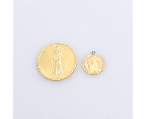 A Tonga 'Half Koula', dated 1962, c.16.29g, and a Napoleon III 5 Fanc gold coin with attached lop for suspension, c. 1.62g. 2