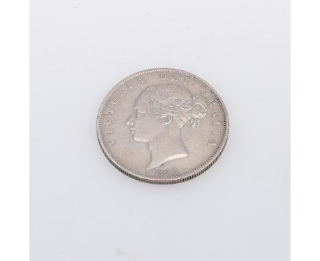 A Queen Victoria Halfcrown, young head l. reverse shield within a wreath, dated 1883.  *CR:  Light rubbing to surfaces revers