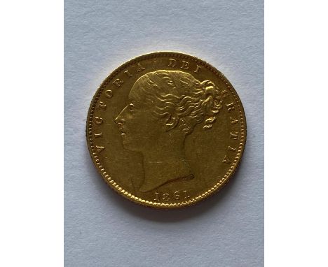 A Queen Victoria Sovereign, Young head l. Shield reverse, dated 1861.  *CR:  Light surface marks and rubbing.  *BP 22.5% (18.