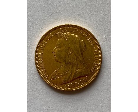 A Queen Victoria Sovereign, old veiled bust l. dated 1893.  *CR:  light surface marks and rubbing.  *BP 22.5% (18.75% plus VA