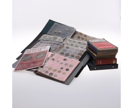 A collection of coins contained in six albums and a quantity of Whitman folders with partial contents. (A lot).  *CR:  Variou