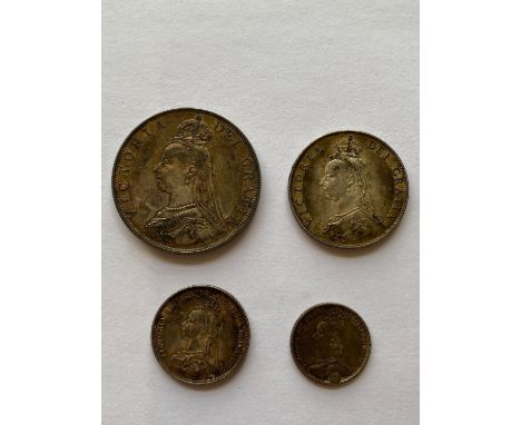 A selection of Queen Victoria Silver coinage for 1887: Double Florin, Florin, Shilling and Sixpence, the sixpence plugged ben