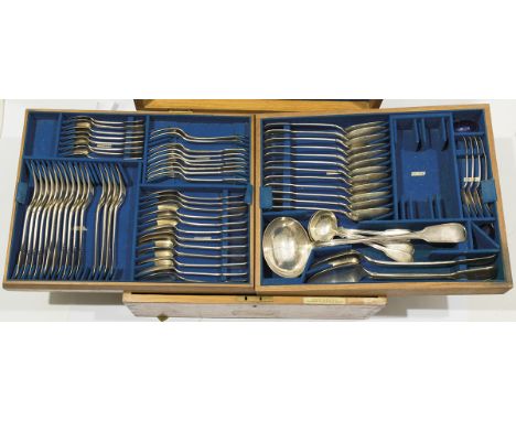 A matched part canteen of 19th Century silver fiddle and thread pattern cutlery, engraved with crest, comprising 12 table spo