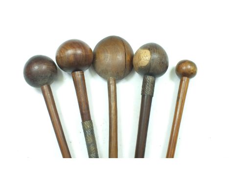 Four various Zulu Knobkerrie collected by Lieutenant-Colonel Gawne, the first with two-tone hard wood spherical head, the haf