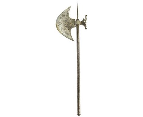 A large 19th Century Indian Tabar axe, 25cm diameter head chiselled with panels of scrolling foliage and flower heads, highli