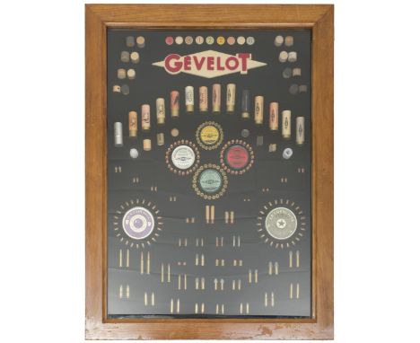 A Gevelot inert cartridge display board, the glazed varnished oak frame containing an extensive selection of sporting, rifle 