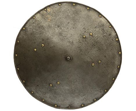 A 17th Century etched Italian shield, the 62cm diameter mildly convex body with turned edge and sparse domed brass rivet deco