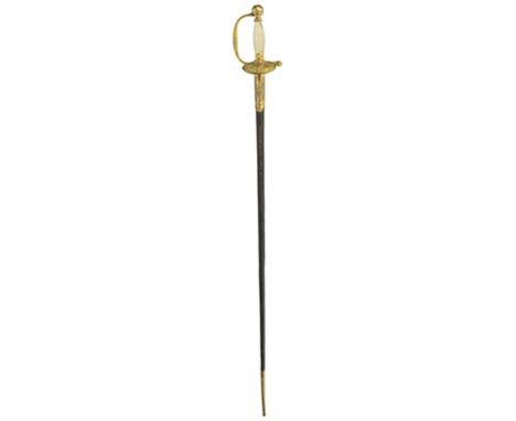 A Second Empire French Naval Officer's sword, 79.5cm triangular section incurved blade decorated with foliage and stands of a