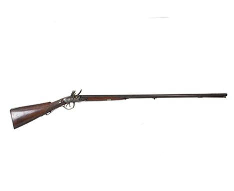 A 20-bore double barrelled flintlock sporting gun by Wogdon & Barton, 37inch sighted two-stage barrels with gold lined breech