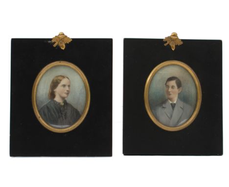 A pair of late 19th Century miniature watercolour on ivory portraits of a lady and gentleman, 8 x 6cm, another on paper of a 