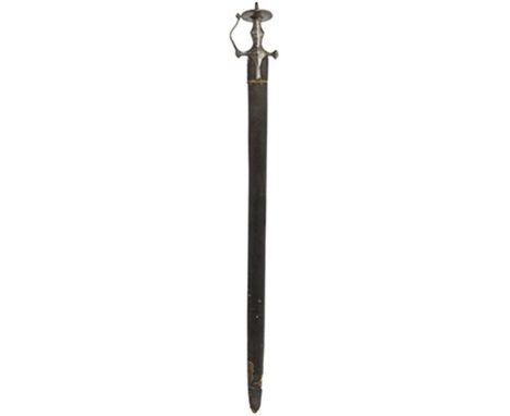 An 18th Century Indian Tulwar, 90cm heavy back sword blade with one broad and one narrow fuller to either side, characteristi