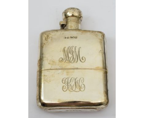 A silver hip flask by James Dixon & Sons, Sheffield 1917, monogrammed, 14cm high, together with a silver cedar lined cigarett