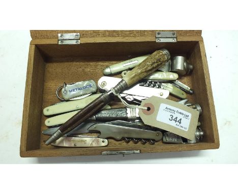 A small collection of pocket knives, to include two German hunting or skinning knives with stag horn grips and white metal mo