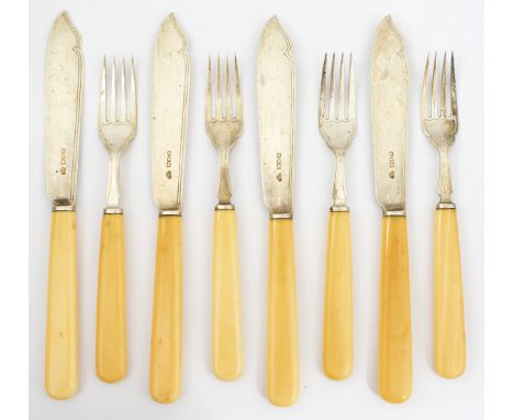 A set of twelve ivory handled silver fish knives, London 1912 by the Goldsmiths and Silversmiths Co. Ltd, together with a mat