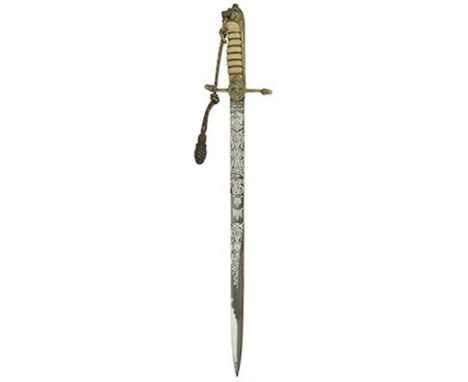 A fine quality Midshipman's dirk, 45.5cm blade by Gieves Ltd, etched with scrolling foliage, crowned GVR cypher, and crowned 