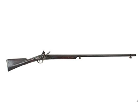 A flintlock Brown Bess sporting gun, 39.5inch sighted barrel, border engraved plain lock, half stocked with regulation brass 