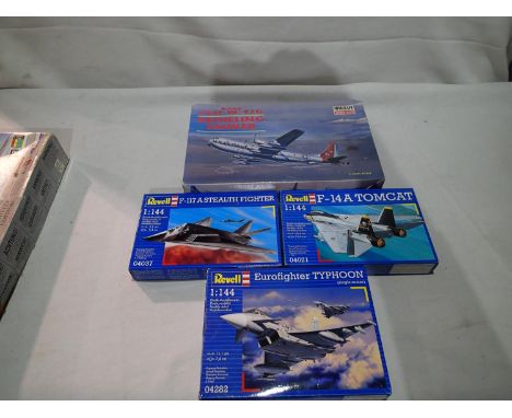 Four 1/144 scale aircraft kits; Minicraft USAF Boeing KC-97G refuelling tanker, Revell F14A Tomcat, F117 stealth and Euro fig