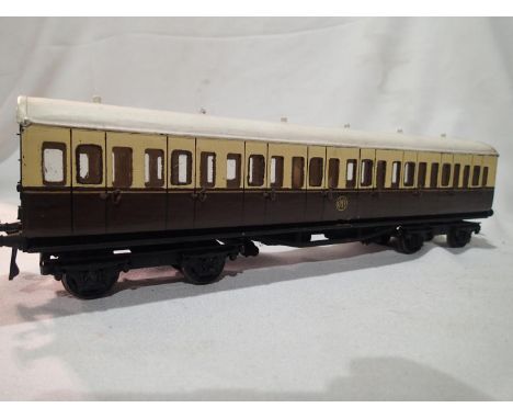 O gauge scratch/kit built G.W.R suburban coach, wood/metal, in fair to good condition. UK P&amp;P Group 1 (£16+VAT for the fi