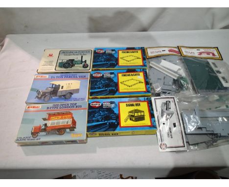 Nine OO scale accessory/scenic plastic kits, steam roller, bus, van, two fencings, signal box, bus depot, bungalow, supermark