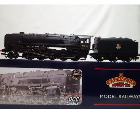 OO gauge Bachmann 32-852 class 9F, 92116, Black, Early Crest, in near mint condition, box with storage wear. UK P&amp;P Group