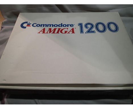 Commodore Amiga 1200 console, transformer, leads, mouse etc, in excellent condition, box with 19/12/92 date label, plus selec