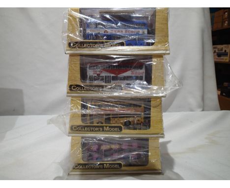 Four Collectors Model 1/76 scale Hong-Kong buses, all near mint in display case with bus stop diorama with outer plastic wrap