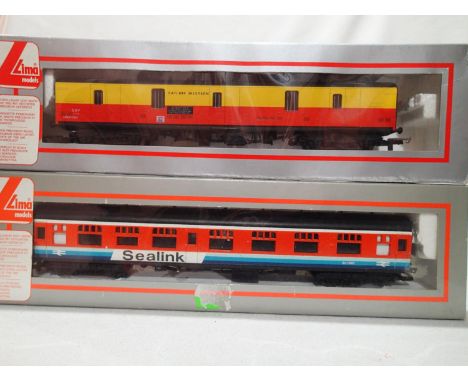Two Lima OO gauge coaches, Sealink and Satlink Western, both in excellent condition, wear to boxes. UK P&amp;P Group 1 (£16+V