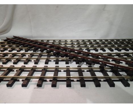 Five lengths of 36 inch, Peco G scale, nickel silver/wooden sleeper, flexi track, four as new, one tracksides painted brown. 